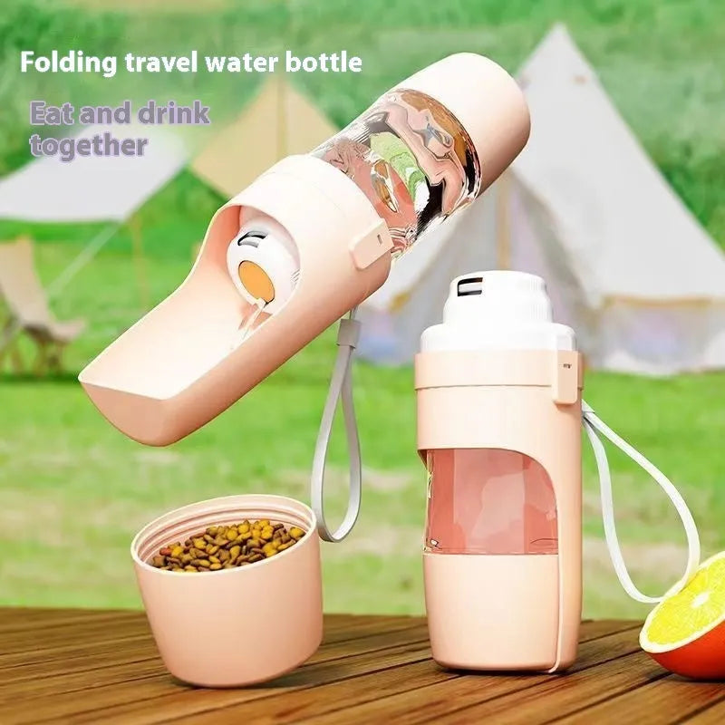 Green 2-in-1 travel dog water bottle and feeder with lanyard, folded to 20cm.
