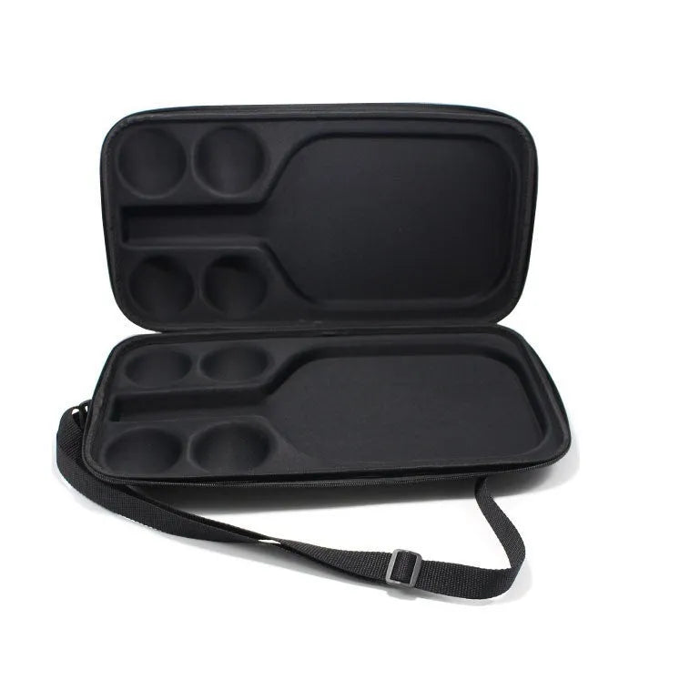 Black pickleball racket storage box with shoulder straps showing EVA construction and equipment compartments
