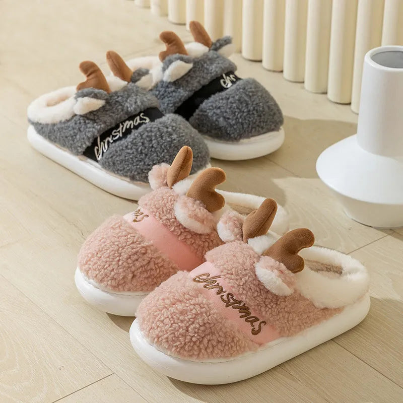 Christmas winter home slippers with suede upper and EVA sole in antler pink colour