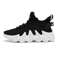 Men's black sock-like low-top lace-up shoes with round toe and flat rubber sole on white background