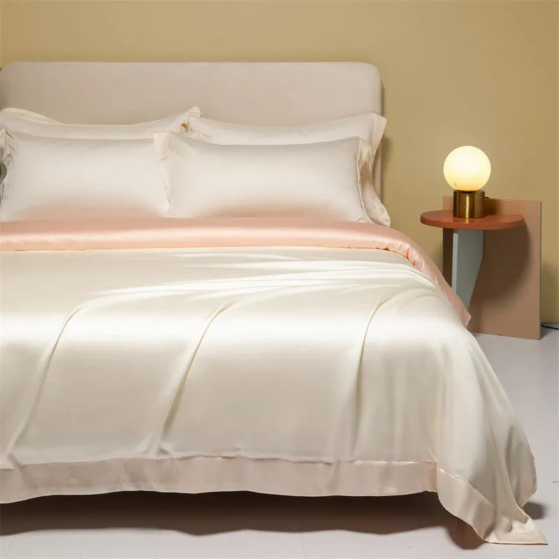 Luxury Tencel Lyocell bedding set with quilt cover, sheet, and pillowcases in grey.
