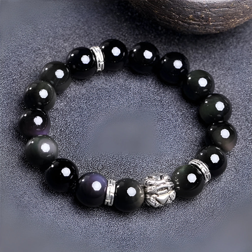 Obsidian bead bracelet with natural cloud patterns and a 999 silver clasp.