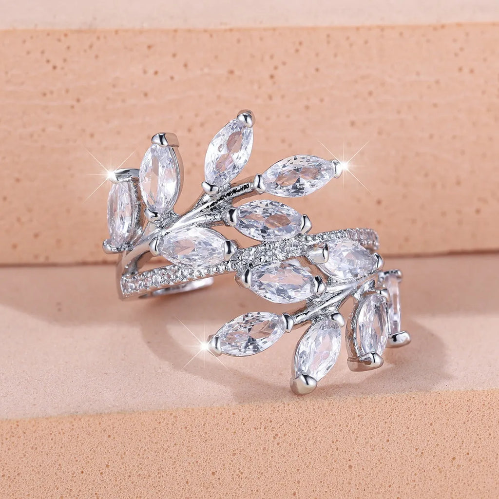 Adjustable copper leaf ring with zircon stones in multiple colour finishes including platinum white and rose gold