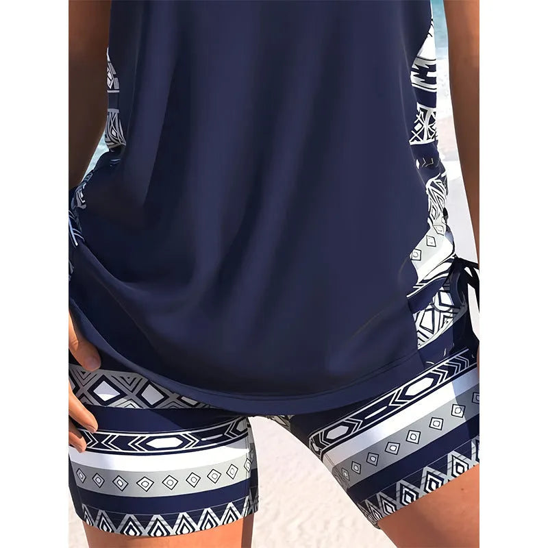 Women's polyester sleeveless conservative split swimsuit with hollow detailing in split swimsuit colour, available in sizes S M L XL XXL