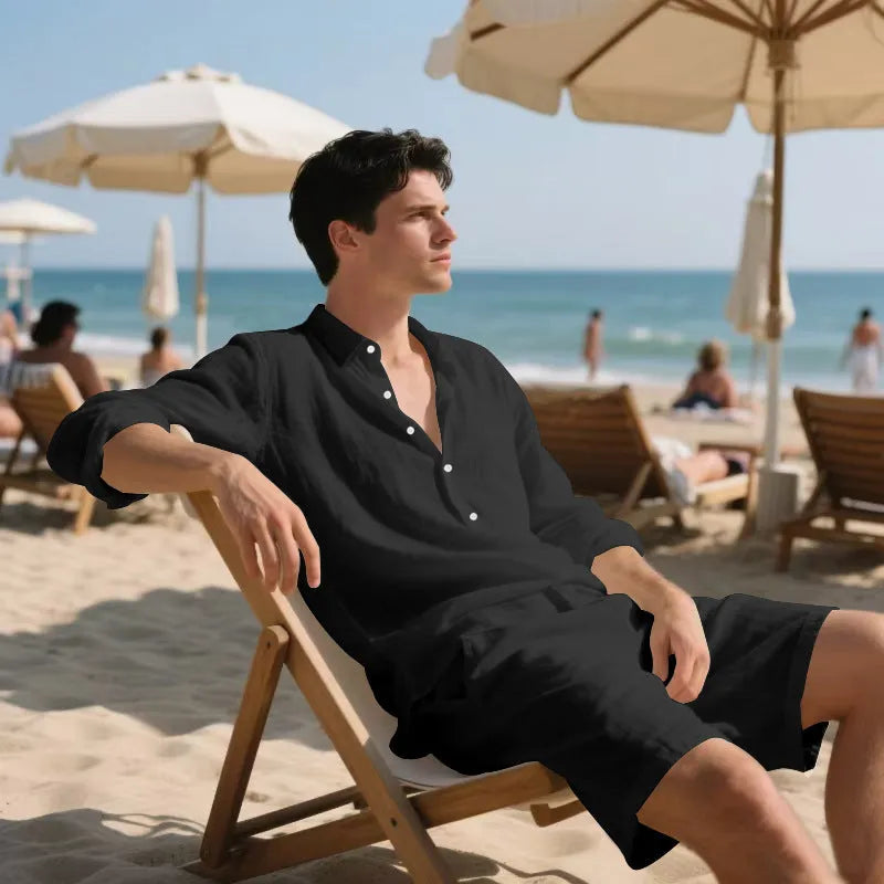 Linen long sleeve shirt and matching shorts beach set in light blue, laid flat.