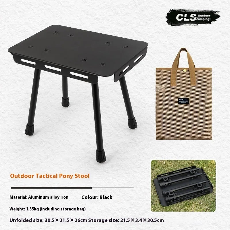 CLS aluminium alloy dual-use folding camping table shown converted into a stool with a green PU mat cushion.