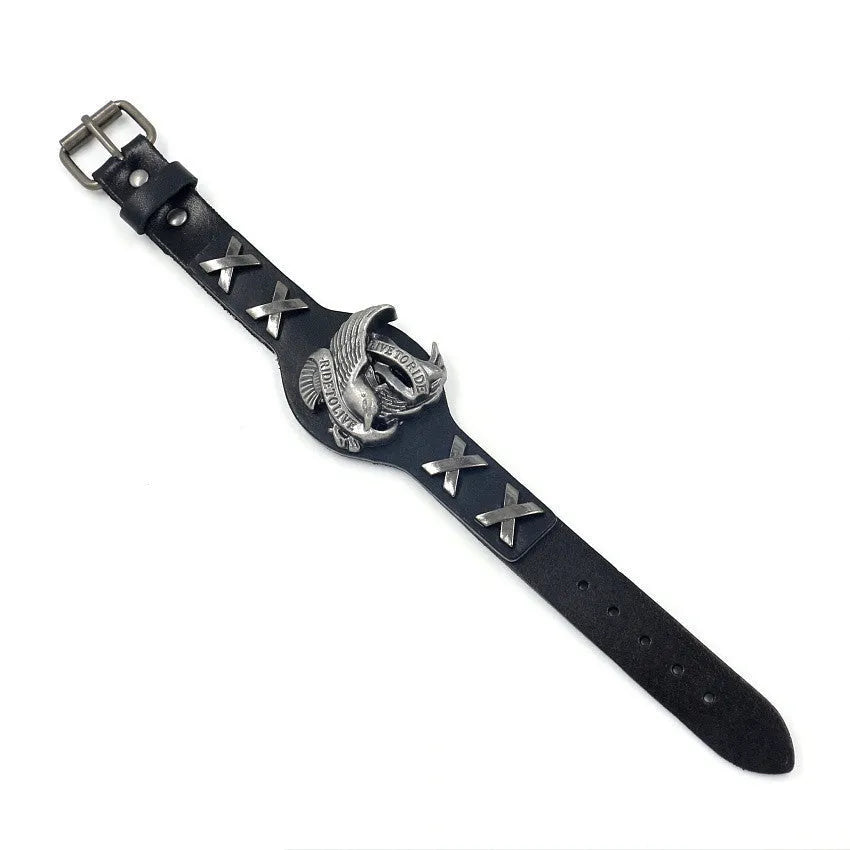 Black geometric eagle head leather bracelet with tapered width and button fastening.
