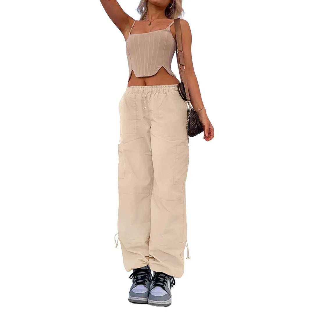 Multi-pocket cargo casual pants in a loose fit, shown in a neutral colour like grey or khaki.