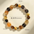 Women's natural yellow 10mm artificial crystal bead bracelet on wrist