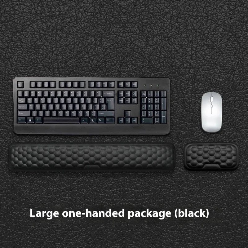 Grey and black memory foam mouse wrist pads with silicone bases, shown in cloth and leather cover options.