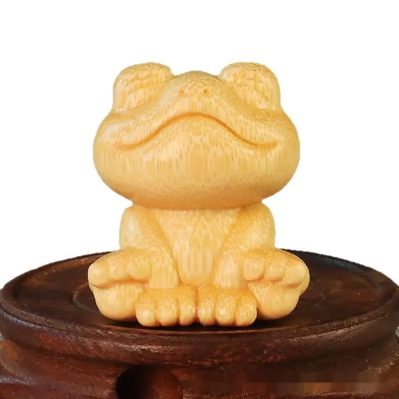 Solid bamboo carving ornament with smiling frog cartoon design, 5cm height