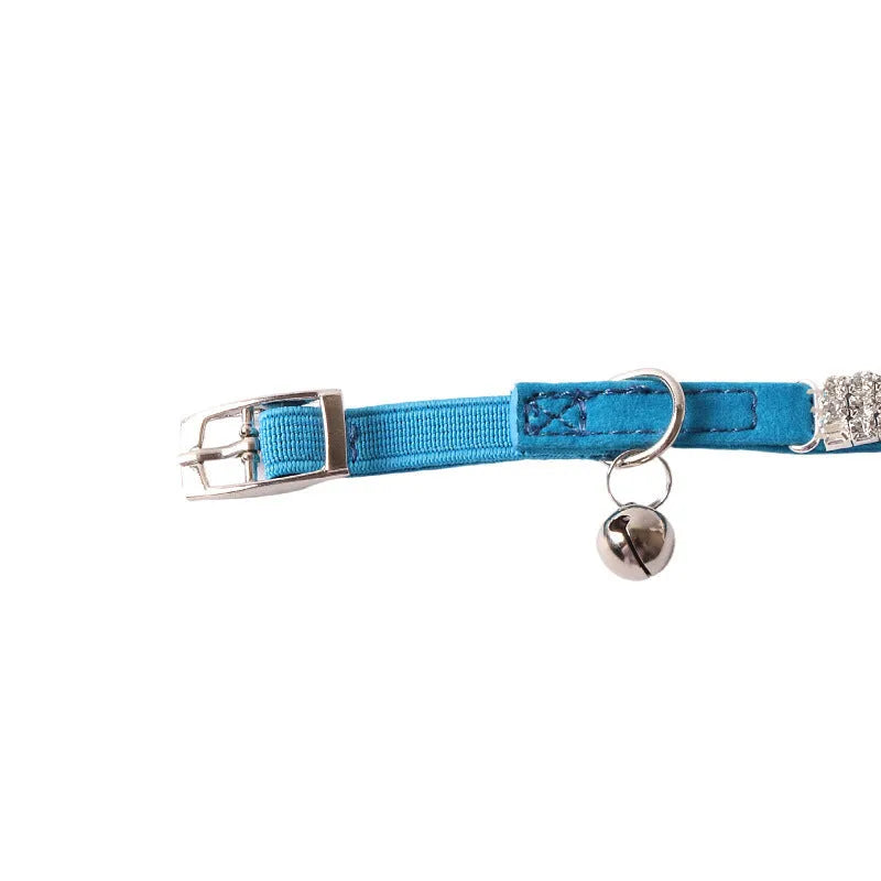 Soft flocking cat collar with an elastic buckle, shown in pink, black, red, blue, purple, and dark brown.
