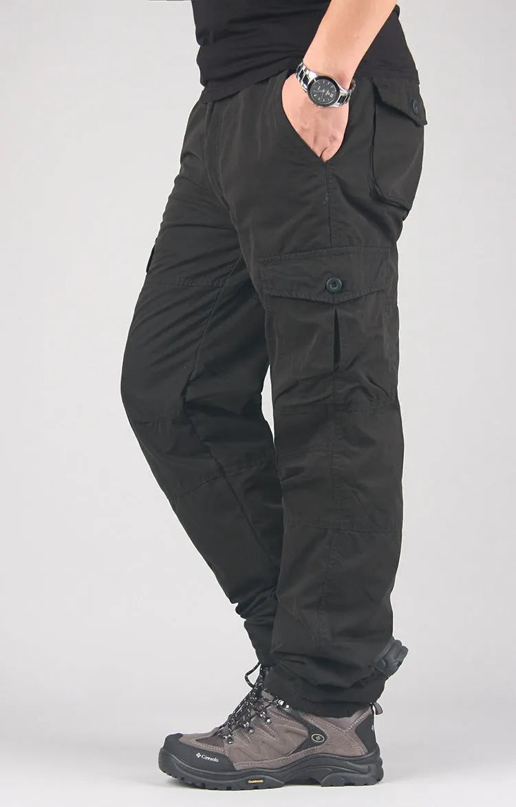 Men's thick cotton overalls with velvet wool lining in khaki colour, showing loose straight-leg fit.
