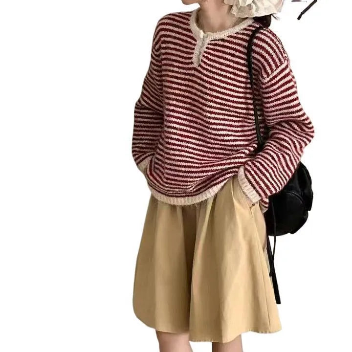 Women's striped cashmere sweater in red and blue colours with plaid pattern and loose fit