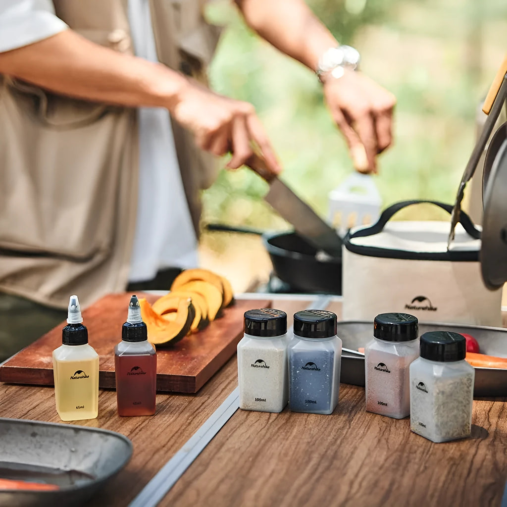 Naturehike six-piece portable seasoning bottle set made from white PP plastic for outdoor and kitchen use.