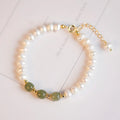 Natural freshwater pearl bracelet with diamond-shaped beads in Hetian jade colour on wrist