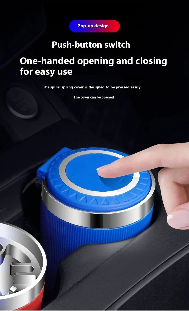 Metal ABS car ashtray with cover and blue LED light against a dark background