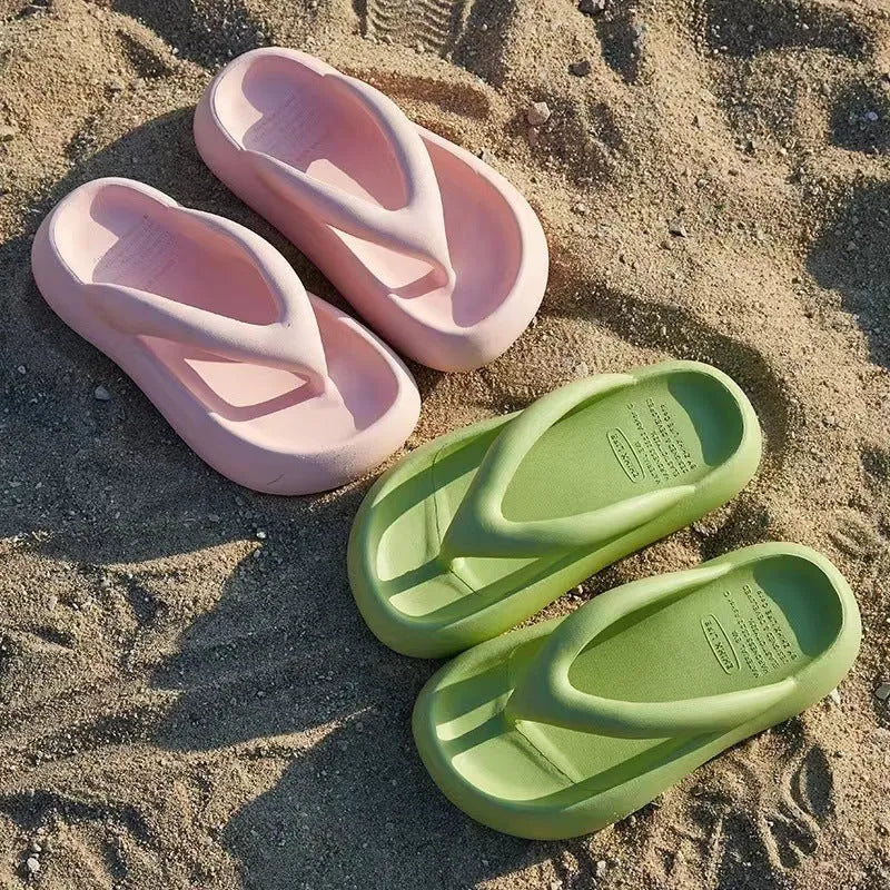 Solid colour EVA flip-flops with a thick sole and a decorative bow on the thong strap.