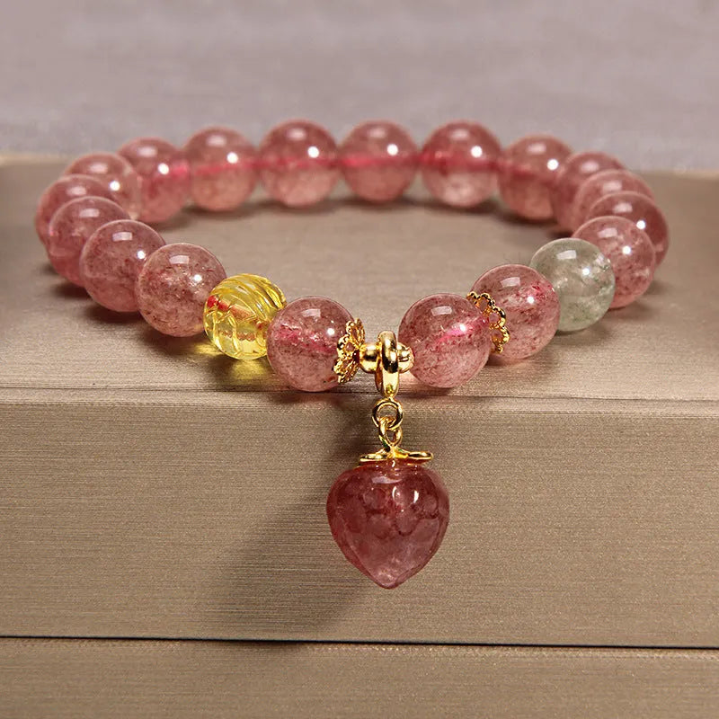 Natural garnet multi-layer crystal bracelet with strawberry quartz, moonstone, and pendant details in Korean light luxury style