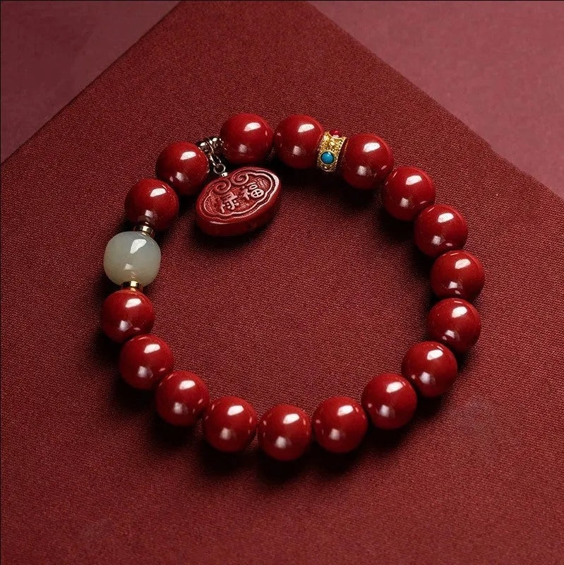 Natural cinnabar bracelet with emperor sandstone Ping An Fu Lu design in 8mm and 10mm sizes