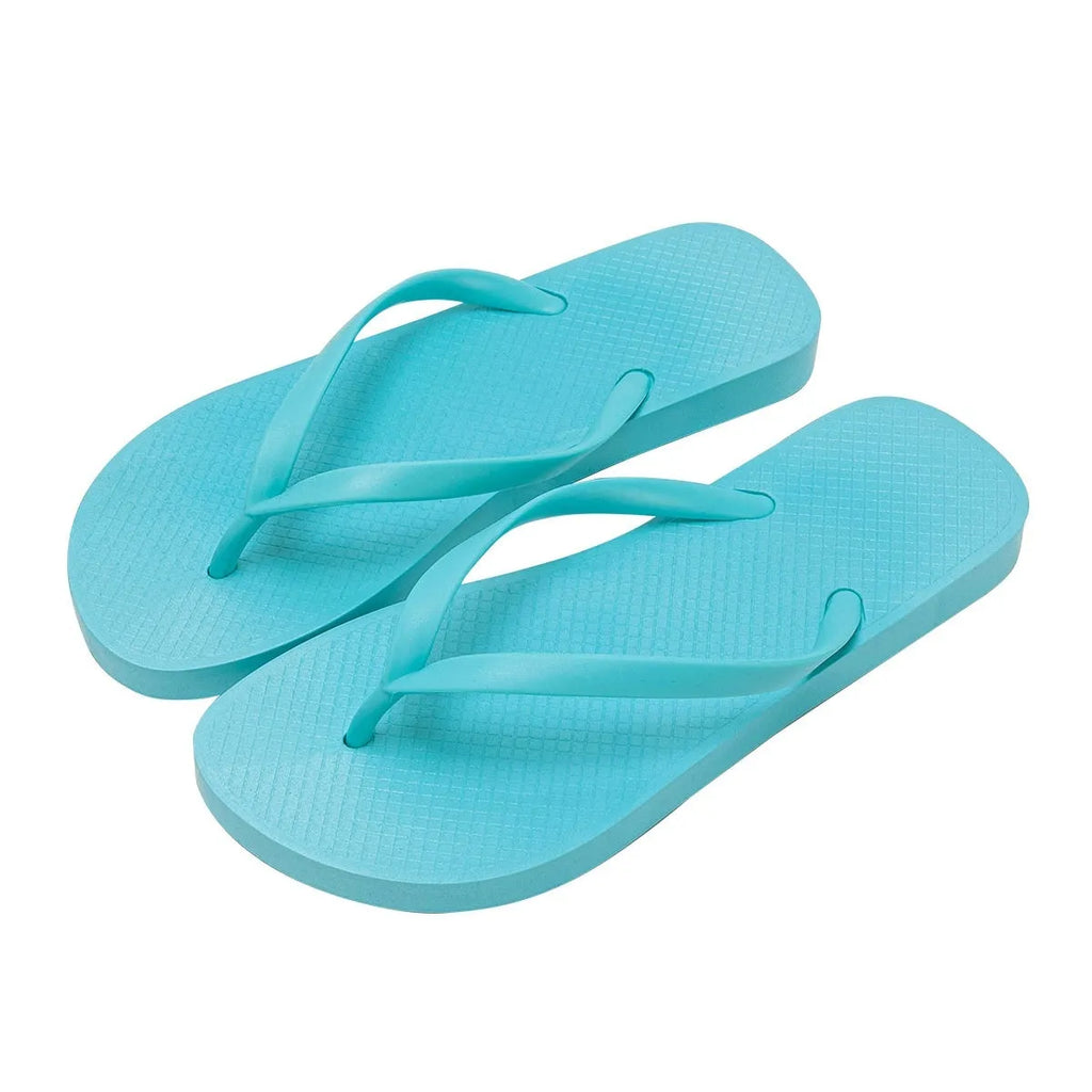 Foldable flat slippers with hollow-out design and non-slip PVC soles in orange, purple, black, or white.