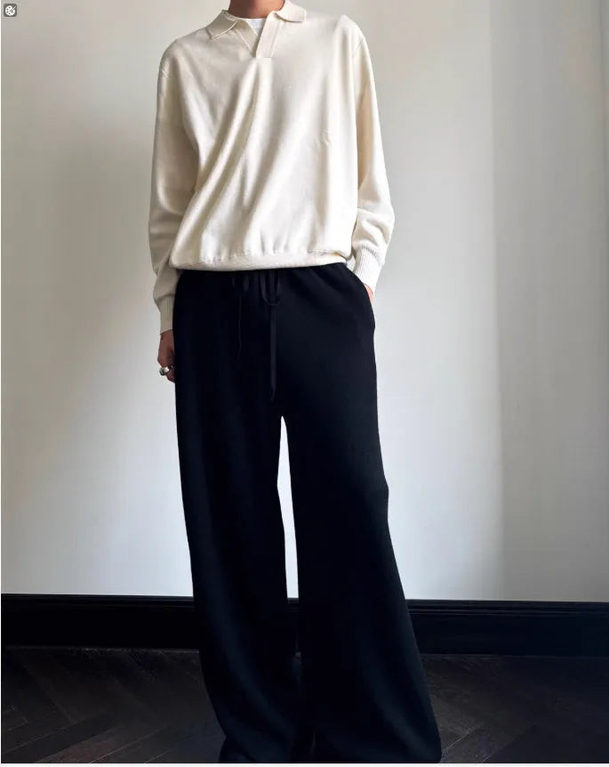 Pure wool polo sweater with a lapel collar in loose fit, shown in Navy Blue.