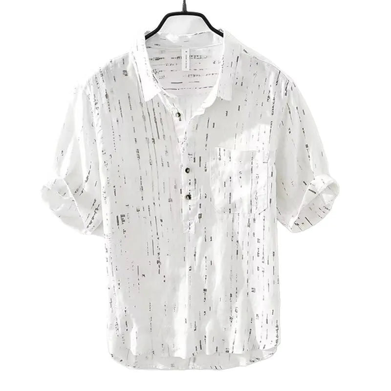 Men's loose fit black and white short sleeve polo shirt on a hanger
