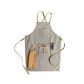 Canvas apron with cross back straps in camel colour