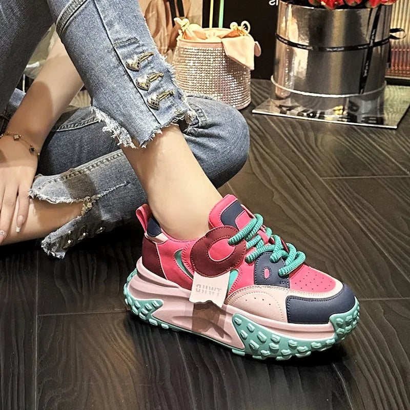 Women's leather casual shoes with a thick wedge heel and lace-up front in four colour options.