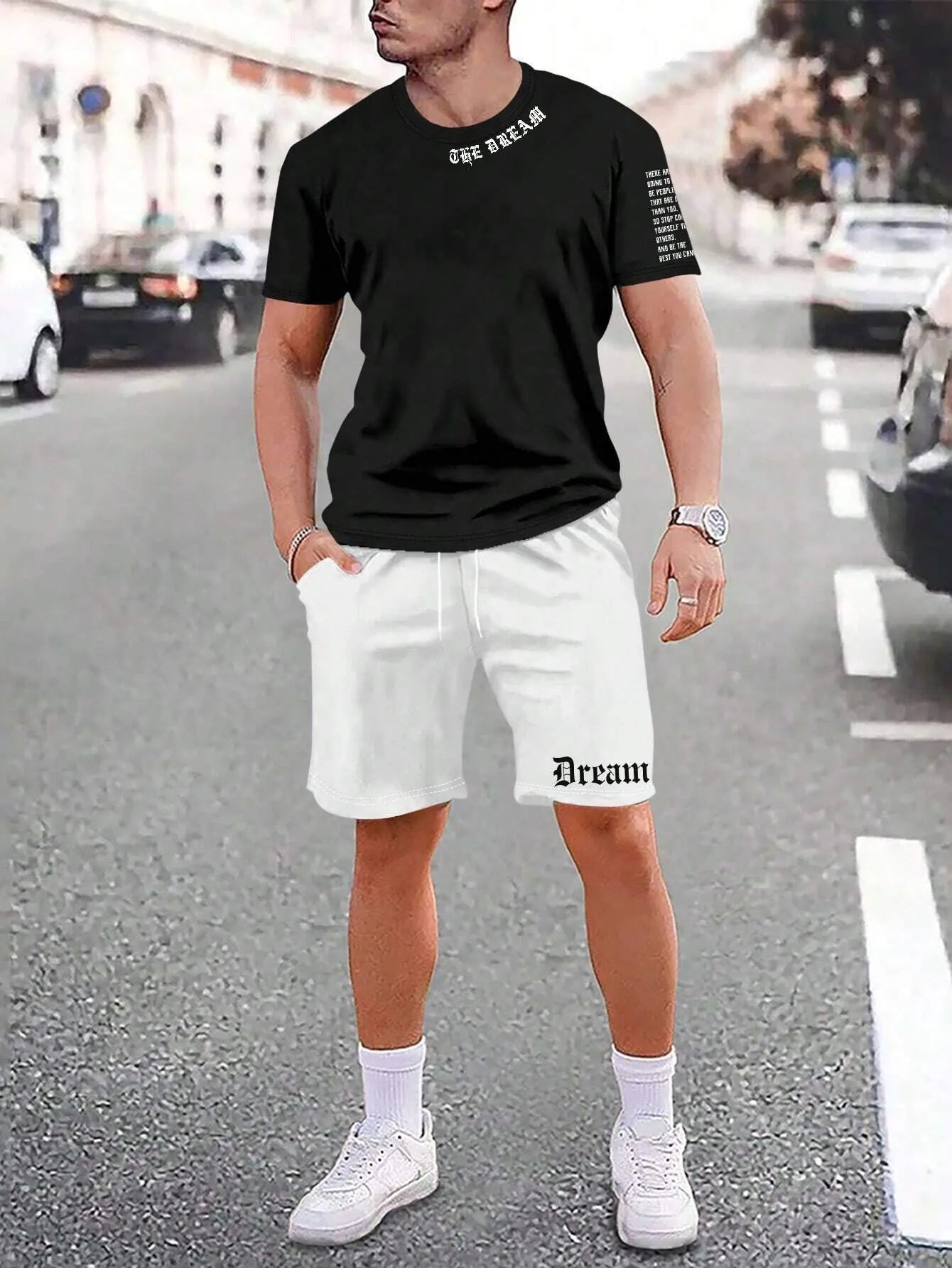Men's grey sports short sleeve top and matching shorts set on hanger