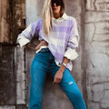 Loose lilac plaid print sweater with ribbed trim on cuffs and hem, long sleeves.