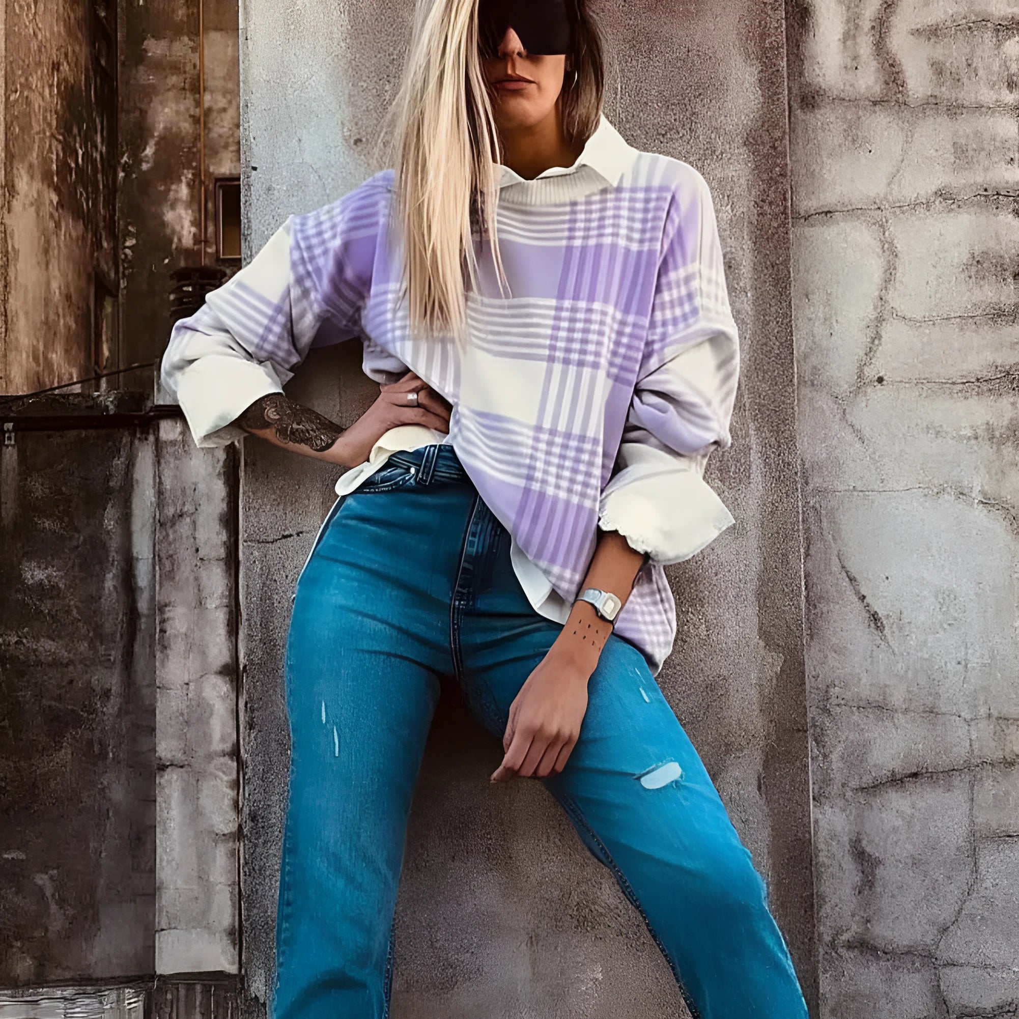 Loose lilac plaid print sweater with ribbed trim on cuffs and hem, long sleeves.
