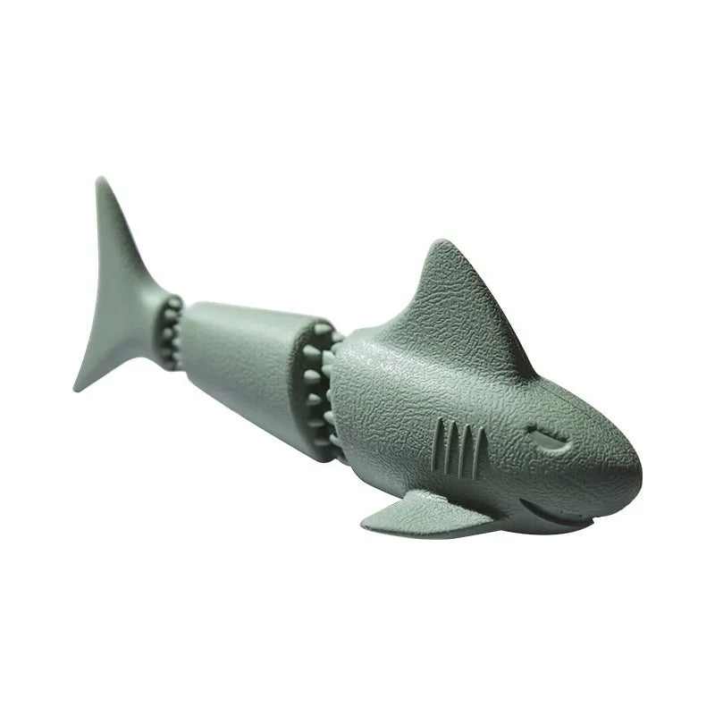 Shark-shaped rubber dog toy in marine colours including conch blue, conch green, starfish blue, and starfish green options