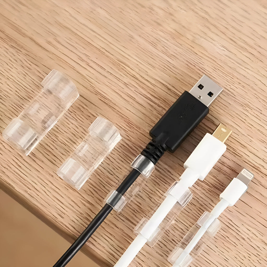 Transparent self-adhesive plastic cable clips for wire management in four different sizes.