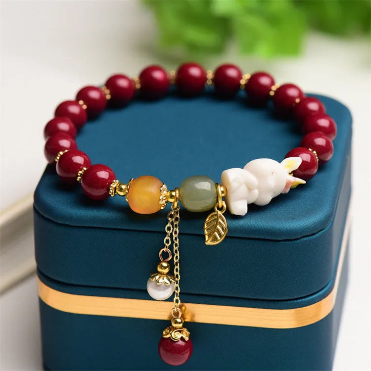 Natural beeswax purple gold sand bracelet with cinnabar rabbit motifs in national style