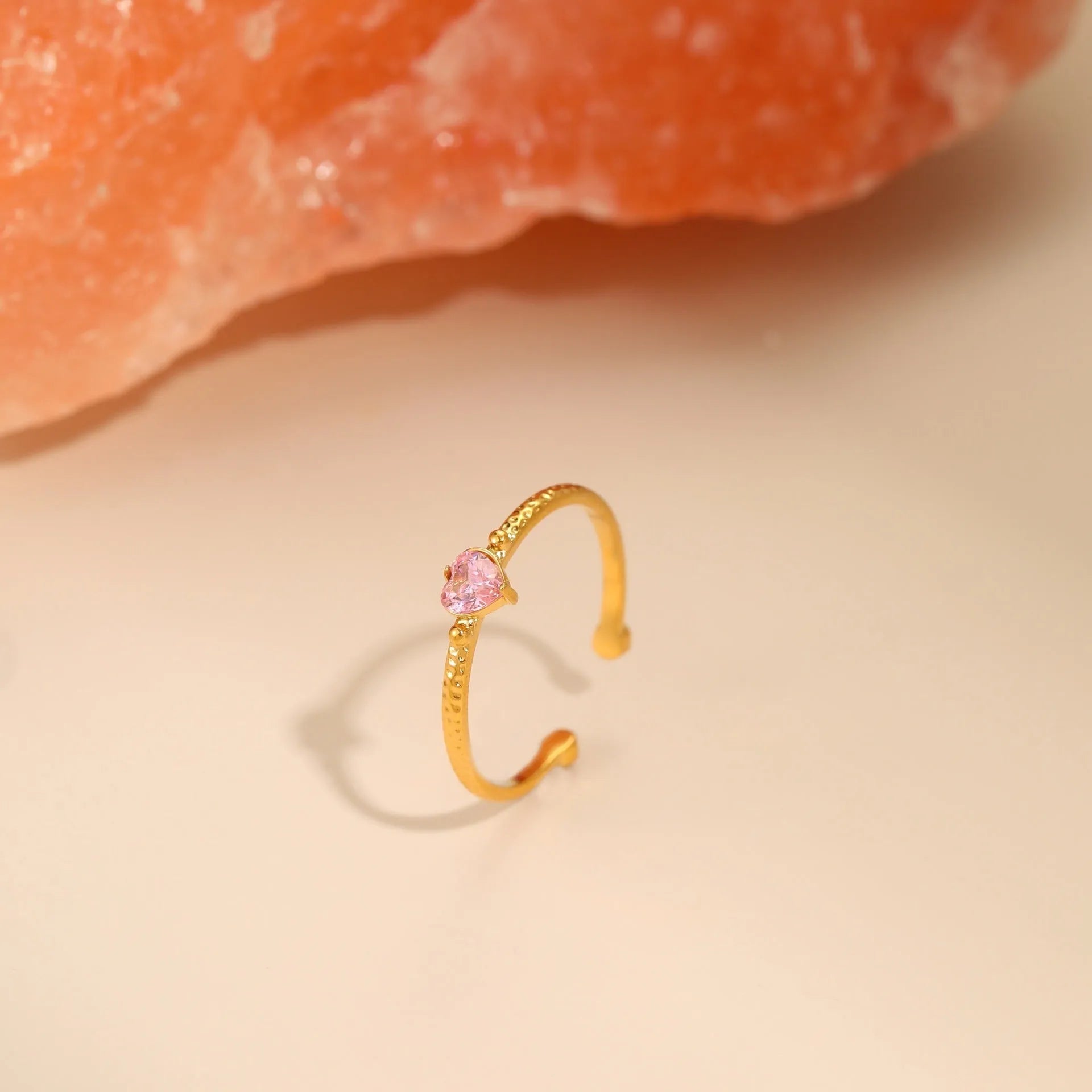 Open-ended stainless steel ring with heart-shaped zircon accents in adjustable free size design