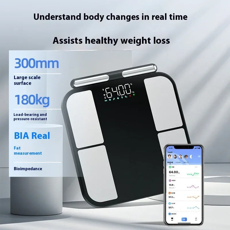 Black electronic health scale with tempered glass platform displaying body composition analysis on colour screen