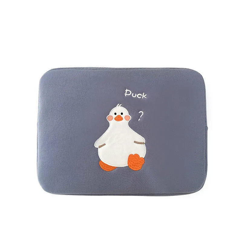 Blue cotton tablet case with embroidered cartoon duck design, zipper closed.