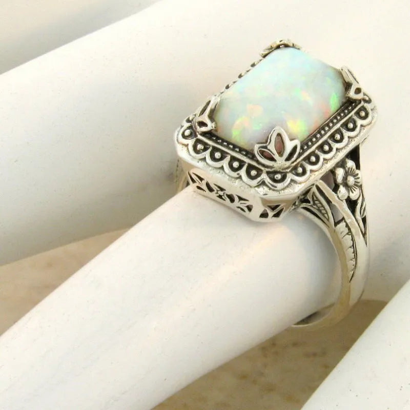 Silver geometric alloy ring with inlaid opal stone, available in multiple sizes