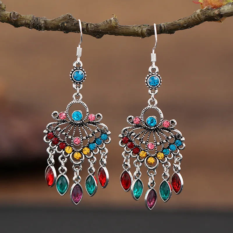 A pair of smart water drop purple retro long fringe drop earrings made from alloy metal.