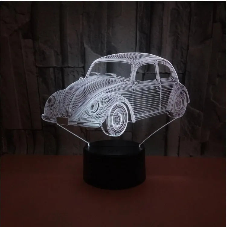 Black acrylic LED table lamp with remote control on wooden desk