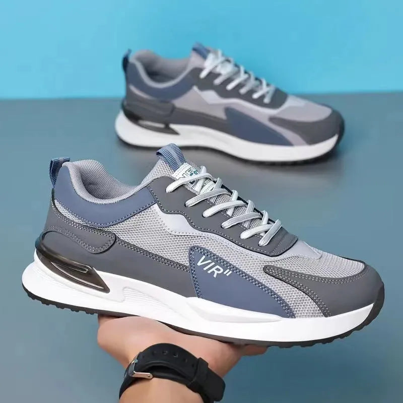 Men's colour block mesh sneakers in black, grey, or white on a plain background