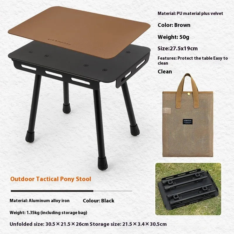 CLS aluminium alloy dual-use folding camping table shown converted into a stool with a green PU mat cushion.