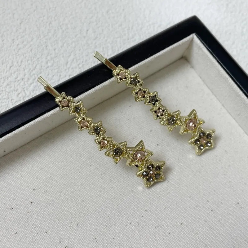 Gold alloy hair barrette with five-pointed star decoration for women's hairstyling