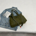 Women's polyester canvas shoulder bag with sandwich pocket in black, white, brown, or green