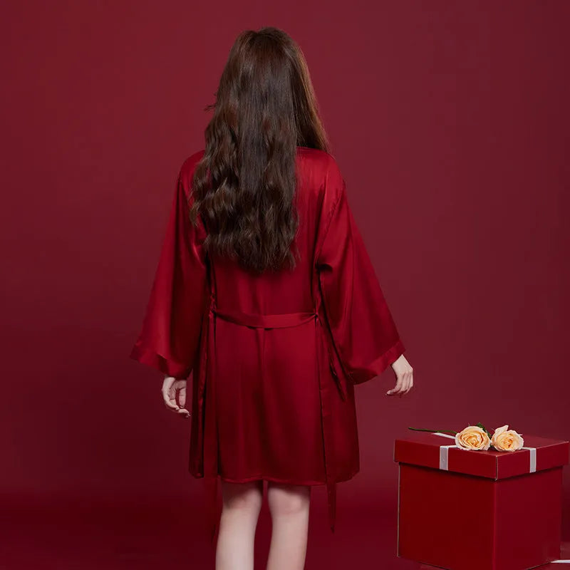 Matching red men's and women's pyjama set with long sleeves and trousers, wedding dowry sleepwear