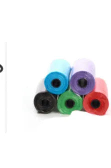 Roll of multi-coloured dog waste bags showing black, blue, green, and pink examples