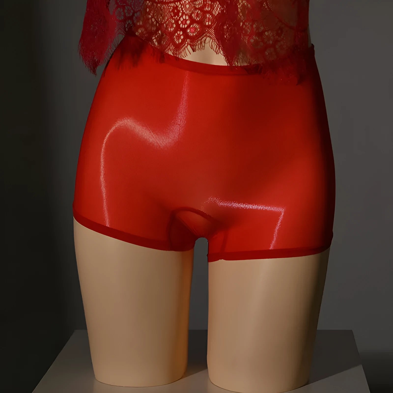 Shiny men's seamless underwear stockings in multiple colours on a mid waist model