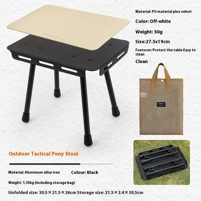 CLS aluminium alloy dual-use folding camping table shown converted into a stool with a green PU mat cushion.