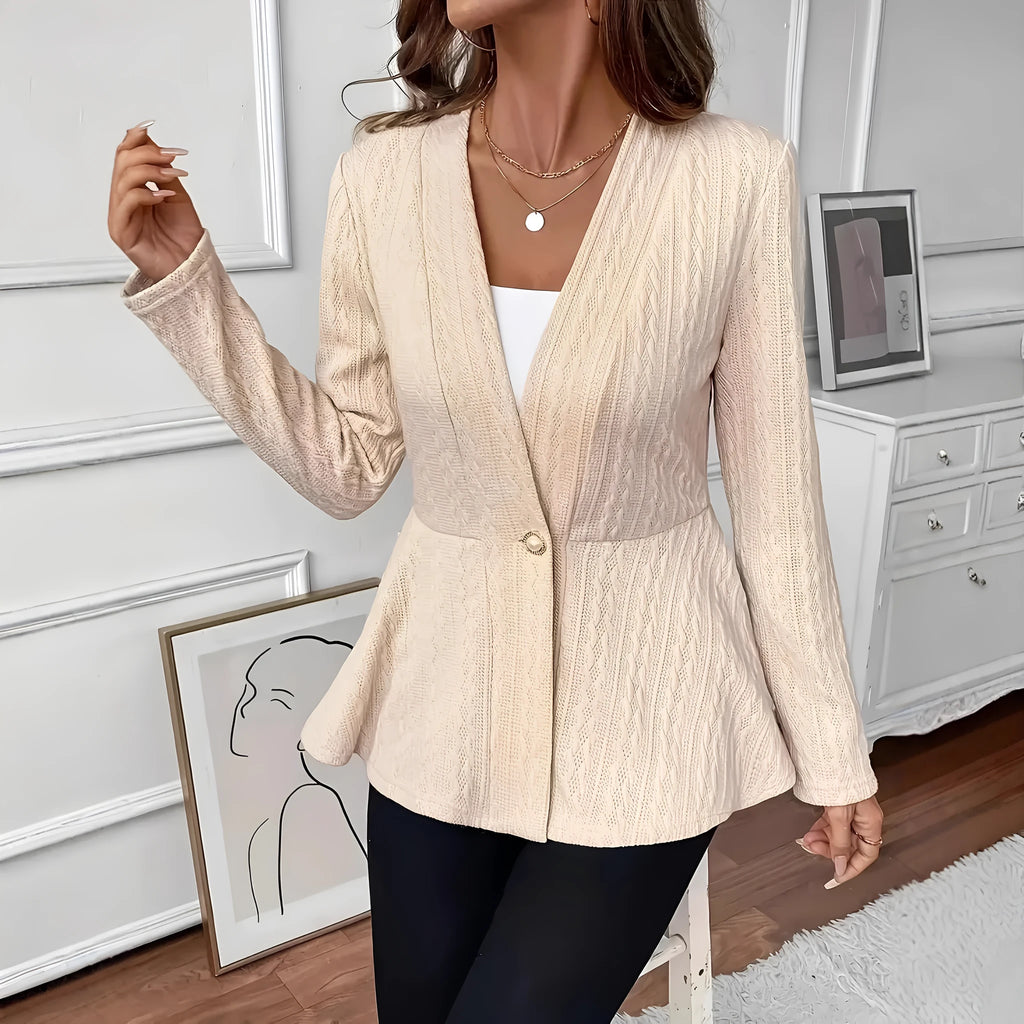 Women's fitted knitted cardigan in apricot colour with one-button fastening and jacquard pattern